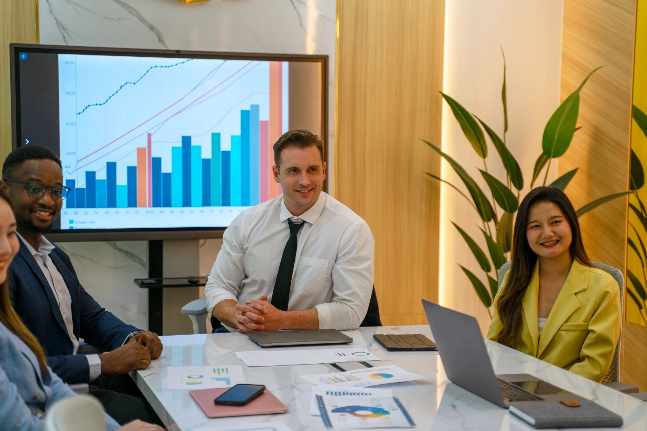 Team meeting in a modern office discussing financial planning