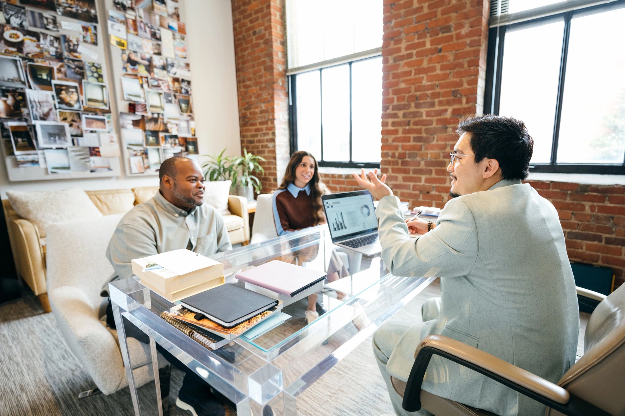 Advisor meeting with business partners to review finances